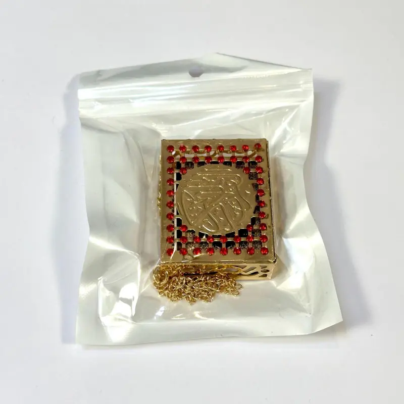 Mini koran i metallåda, guld/röd