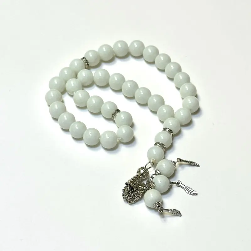 Klassisk perle tasbih med sølvdetaljer, 33 perler (7 farver)
