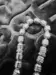 Tasbih i metall med dekorerade pärlor, 33 pärlor